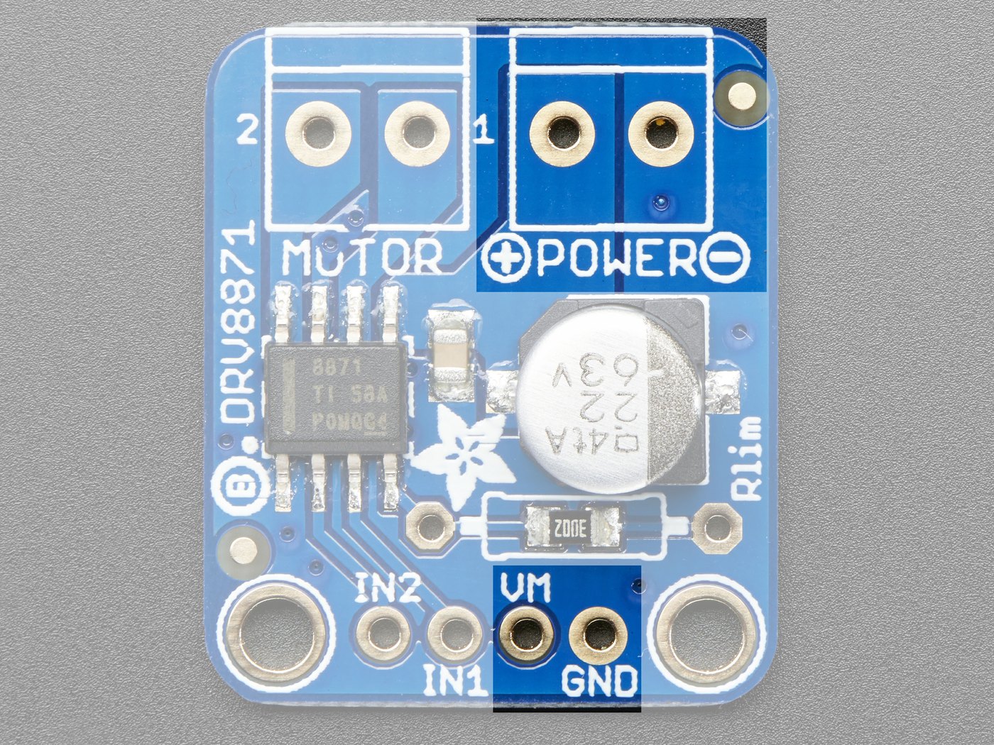 Adafruit DRV8871 showing MOTOR and POWER screw terminals and the IN2 IN1 VM GND header